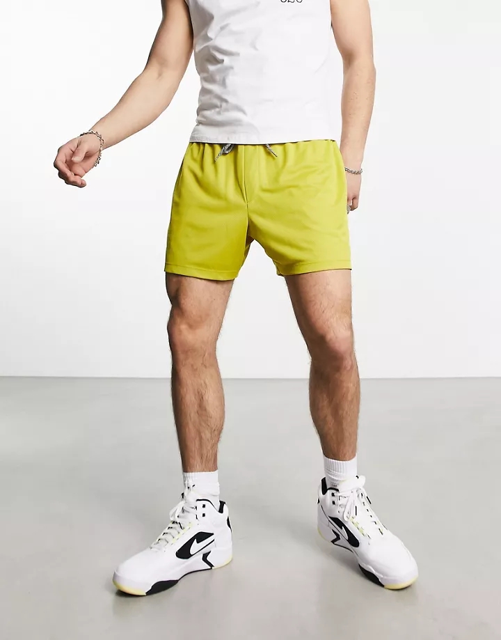 Pantalones cortos amarillo mostaza holgados de malla deportiva de DESIGN MUSTARD CBUECN6h