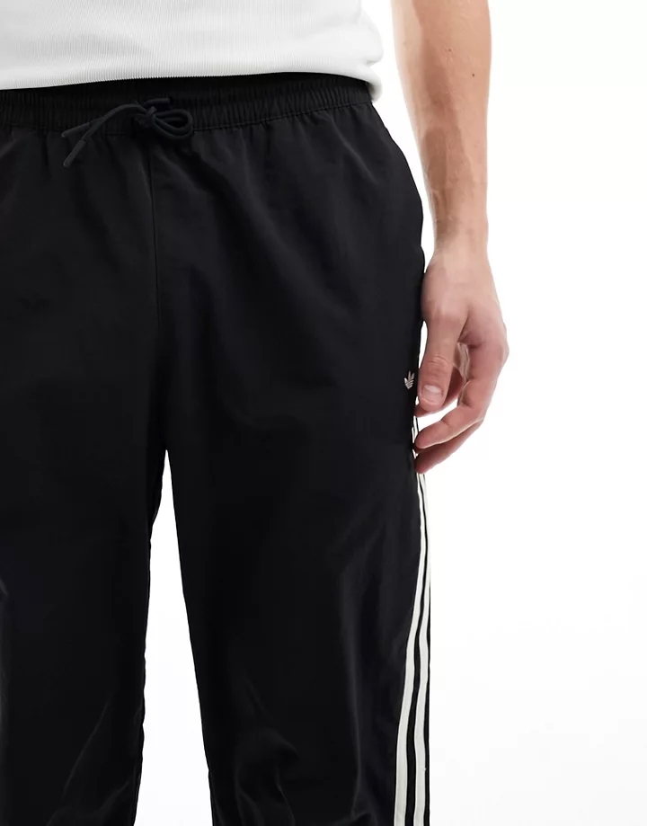 Pantalones de chándal negros de baloncesto de adidas Originals Negro D7YuAFNZ