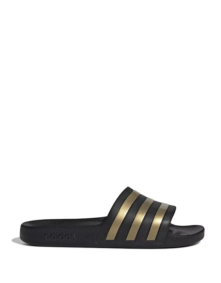 Sandalias negras y doradas Adilette de adidas Sportswear Negro DT9zXrFP