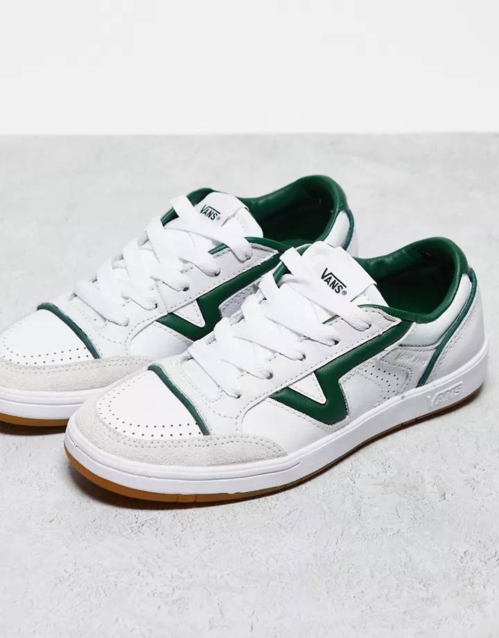 Zapatillas de deporte blancas y verdes con suela de gom