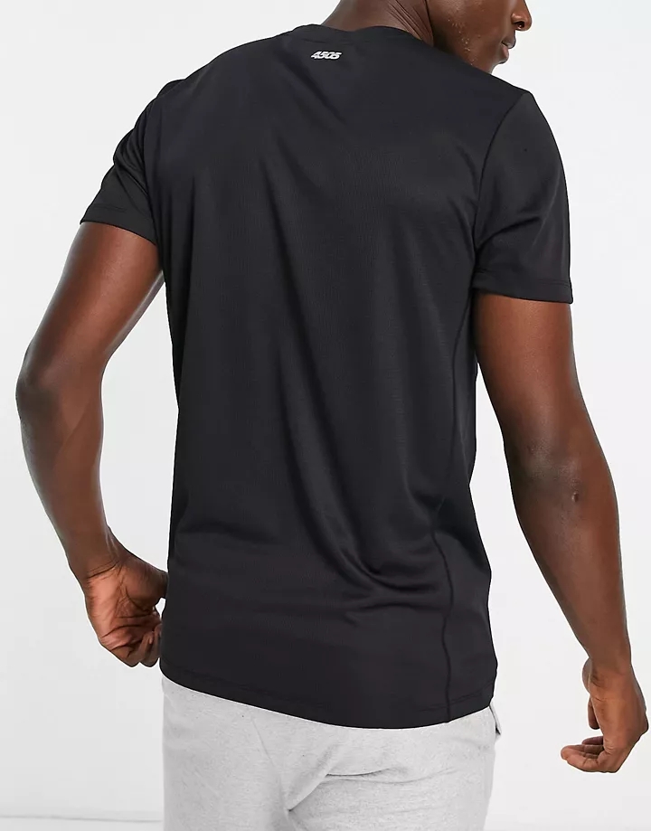 Camiseta deportiva negra en tejido de secado rápido con detalle de icono de 4505 Negro GWErRiQx