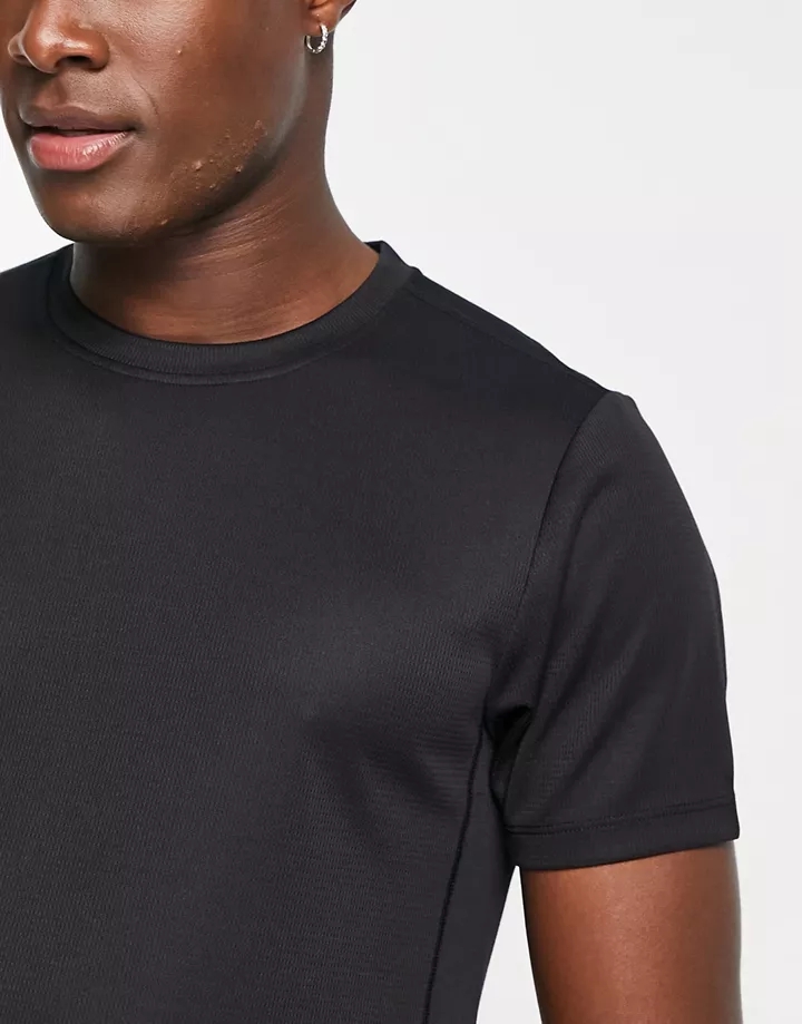 Camiseta deportiva negra en tejido de secado rápido con detalle de icono de 4505 Negro GWErRiQx