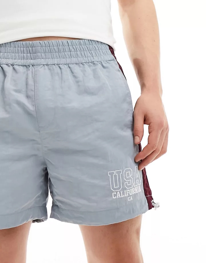 Pantalones cortos azules de corte ancho con bordado y bandas laterales de nailon de DESIGN Azul Gw02eK4x