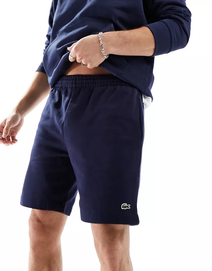 Pantalones cortos azul marino con logo de punto de Lacoste Azul marino HbvR85KT