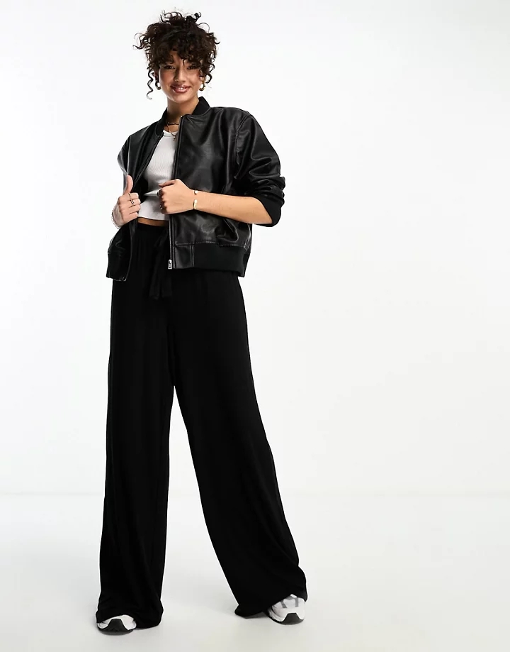 Pantalones negros de pernera ancha con cinturón anudado de DESIGN Tall Negro bO1Sc0A3