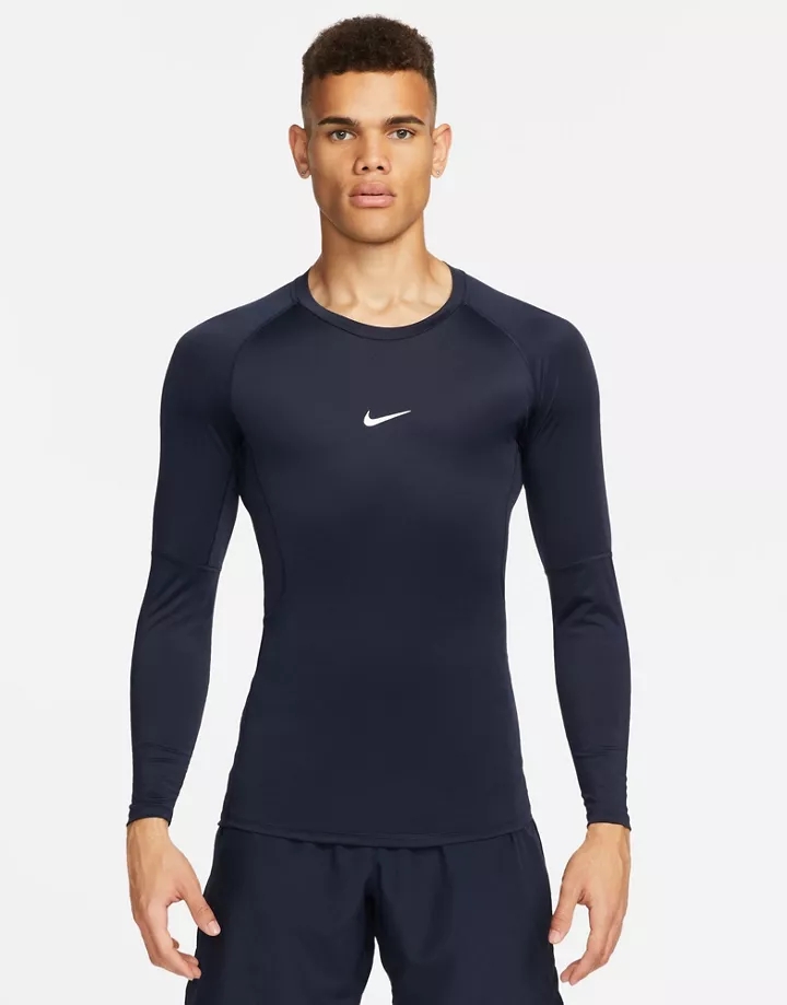 Top azul marino ajustado de manga larga de Nike Pro Tra