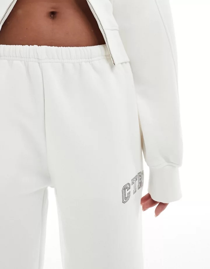 Joggers blanco hueso con diseño universitario de The Couture Club (parte de un conjunto) Crema cxgYAATz