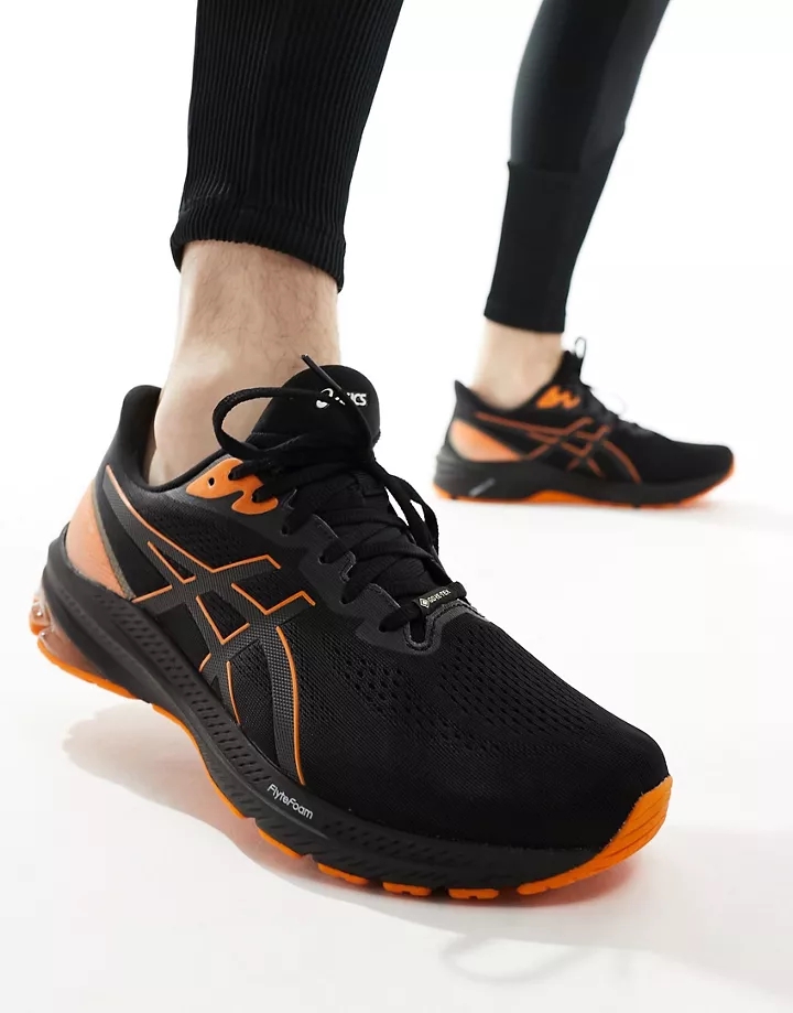 Zapatillas de deporte negras y naranjas de estabilidad para correr GT-1000 12 GTX de Asics Negro d9Au0c2E