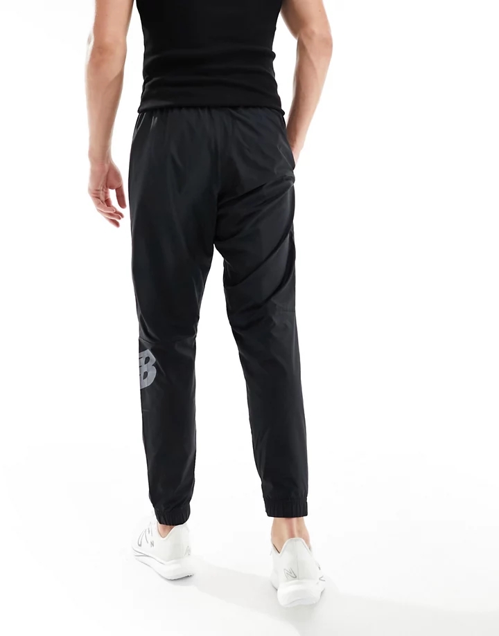 Pantalones negros Tenacity de New Balance Negro drTlCn94